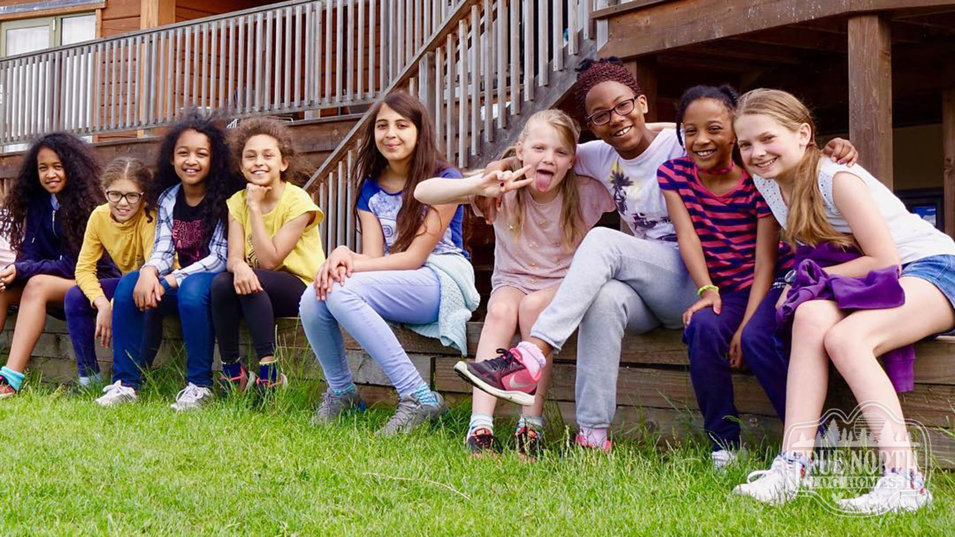 Pine Lake Camp 2 kiods on stairs